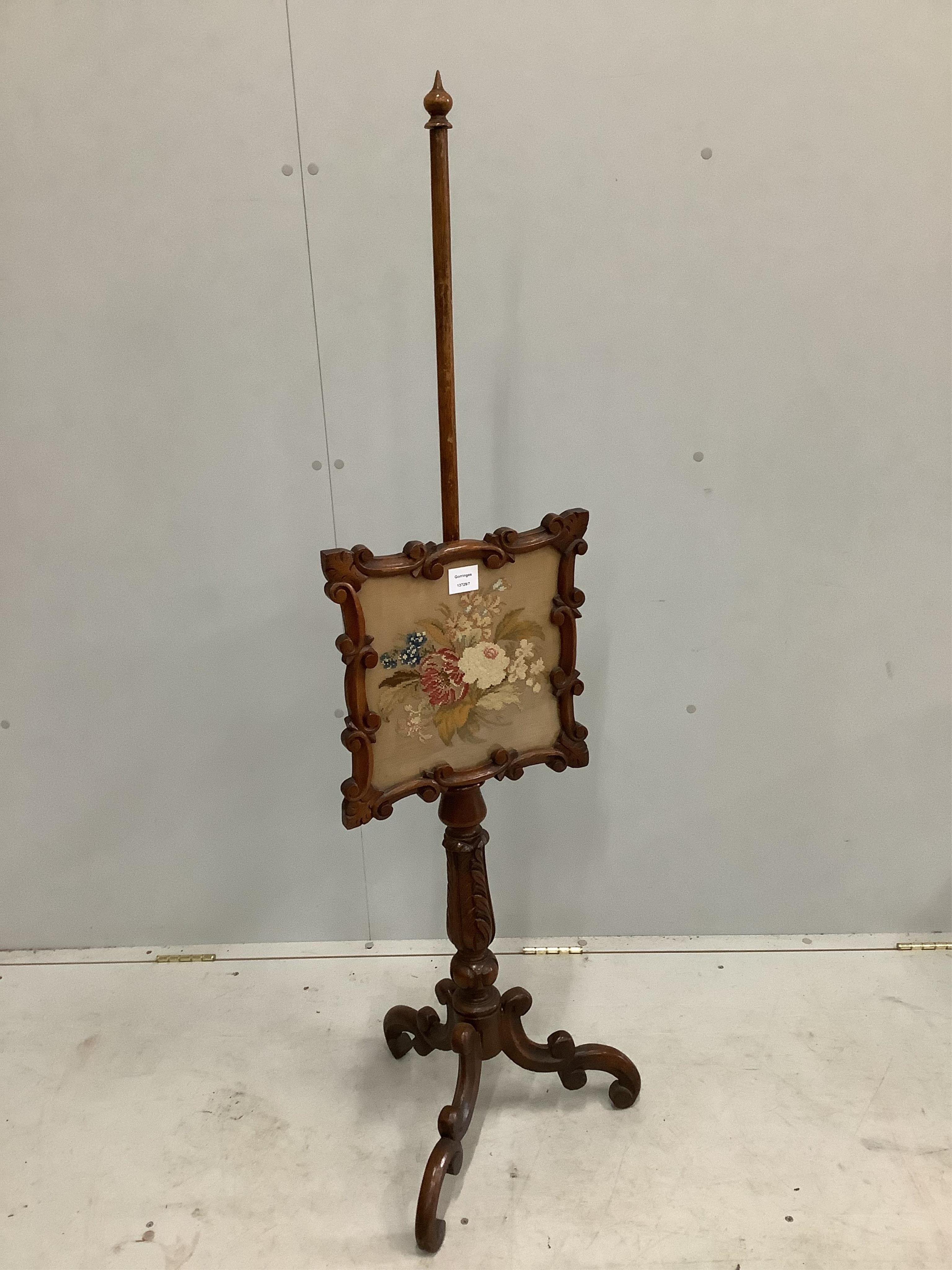 A Victorian mahogany polescreen, height 142cm